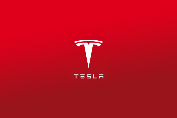 Obrazek przedstawia logo firmy Tesla, o której jest artykuł.